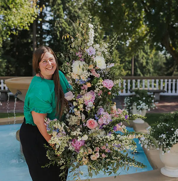 Local  Florist Laura Wheeler, designing wedding flowers at Lairmont Manor in Bellingham, Washington