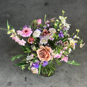 Small arrangement using seasonal flowers each month for a year