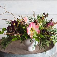 Load image into Gallery viewer, Winter floral arrangement with stunning PNW foliage and lush winter blooms like Amaryllis and Hellebore