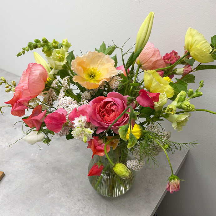 yellow and coral thinking of you floral arrangement