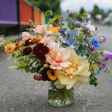 Load image into Gallery viewer, A Pride rainbow arrangement photographed on the rainbow bridge on Northwest Ave in Bellingham Washington.